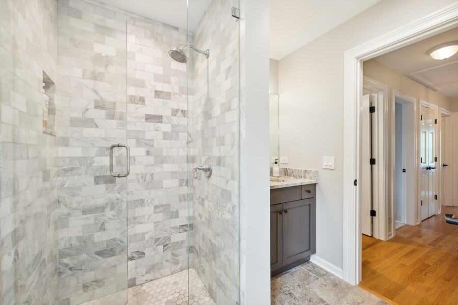 930 Pontiac Road Wilmette, IL 60091 - Photo 29 of 45 a bathroom with a shower and a sink