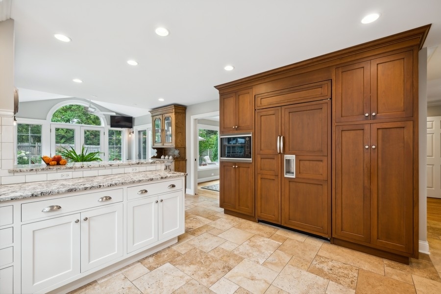 930 Pontiac Road Wilmette, IL 60091 - Photo 10 of 45 a spacious bathroom with a granite countertop sink and a mirror