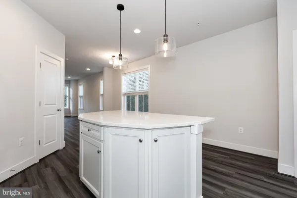 a view of a kitchen and a sink