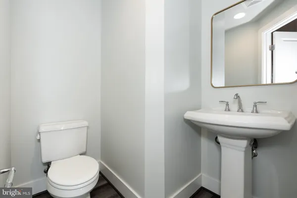 a bathroom with a sink and a toilet