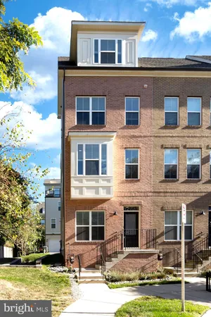 a front view of a building with street view