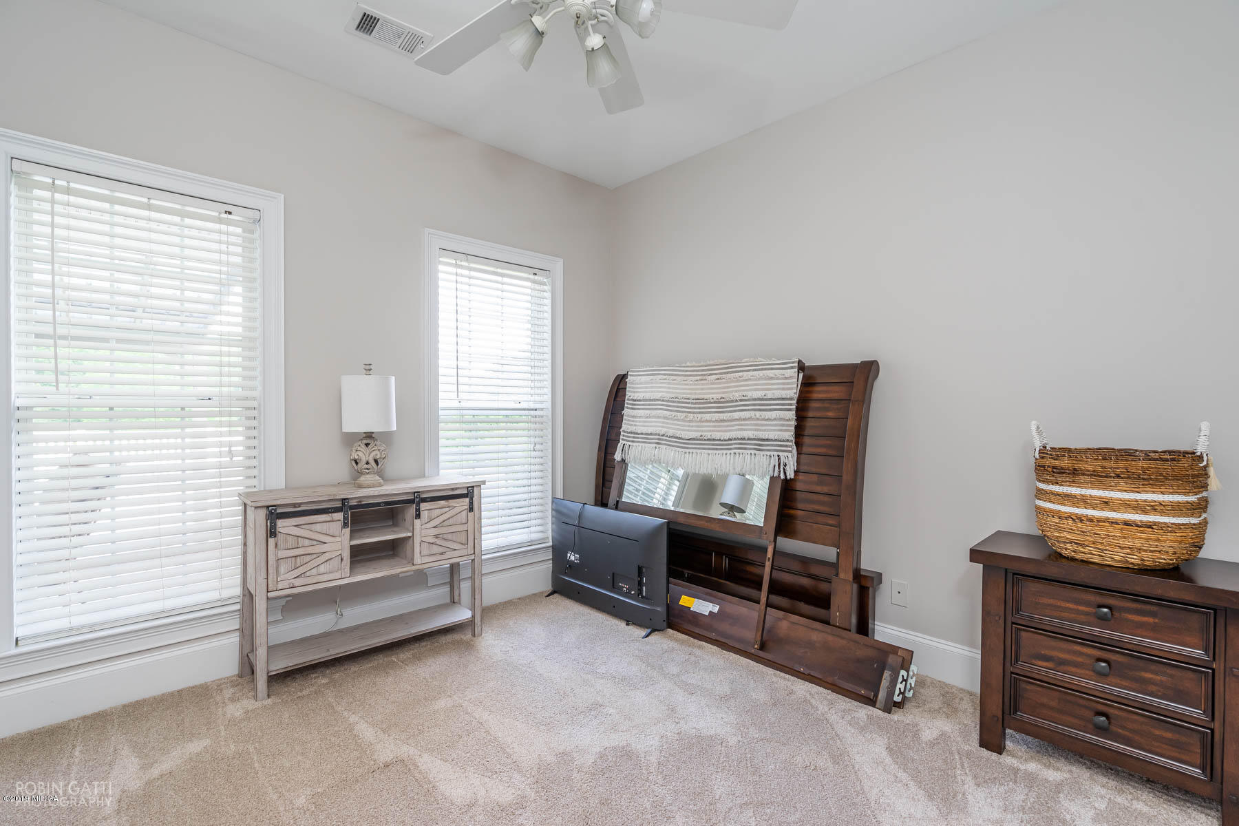 9801 Lower Thomaston Road Macon, GA 31220 - Photo 29 of 40 a bedroom with furniture and a window
