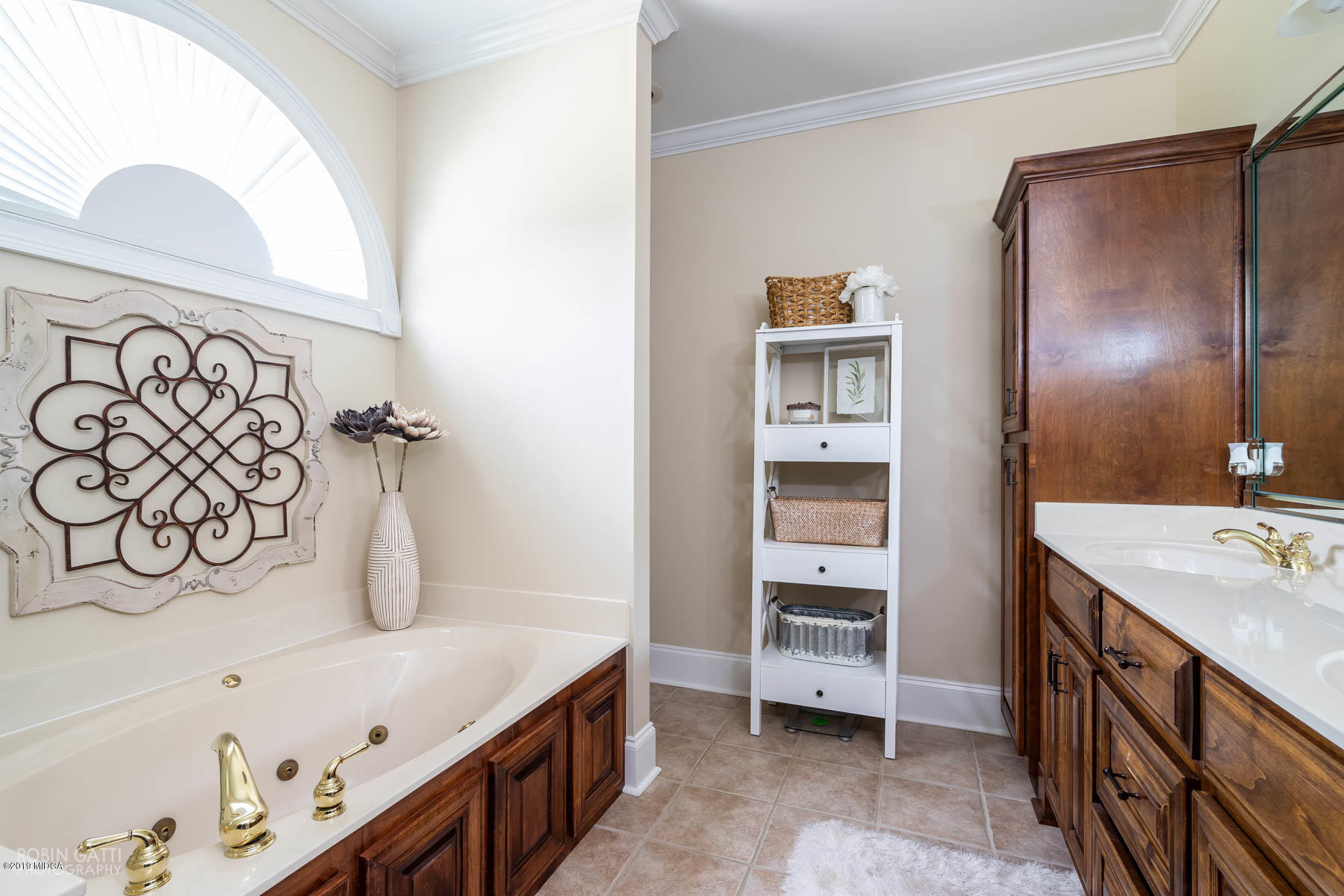 9801 Lower Thomaston Road Macon, GA 31220 - Photo 34 of 40 a bathroom with a sink and a mirror