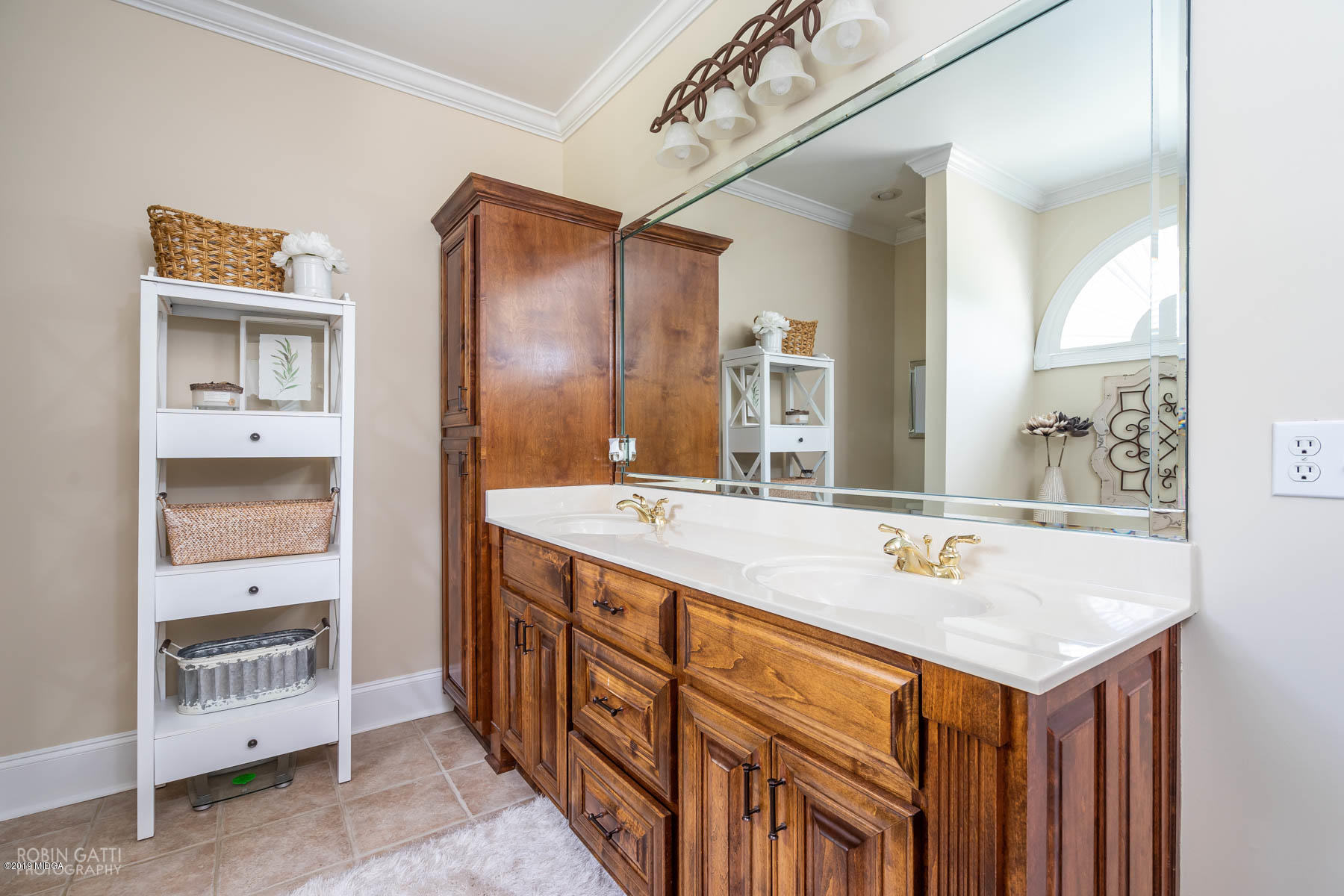 9801 Lower Thomaston Road Macon, GA 31220 - Photo 35 of 40 a bathroom with a sink double vanity and a mirror
