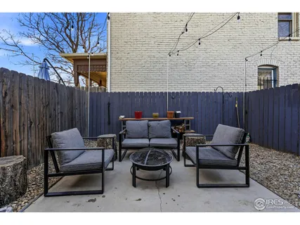 a building outdoor space with patio furniture
