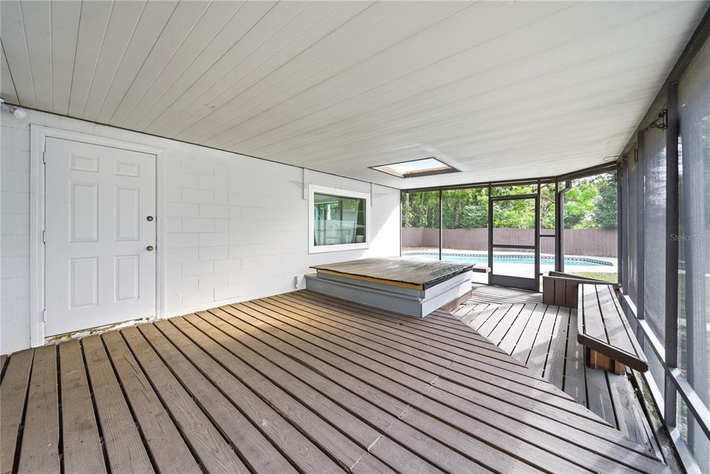 4988 Clarcona Ocoee Road Orlando, FL 32810 - Photo 25 of 48 a view of outdoor space with deck and furniture