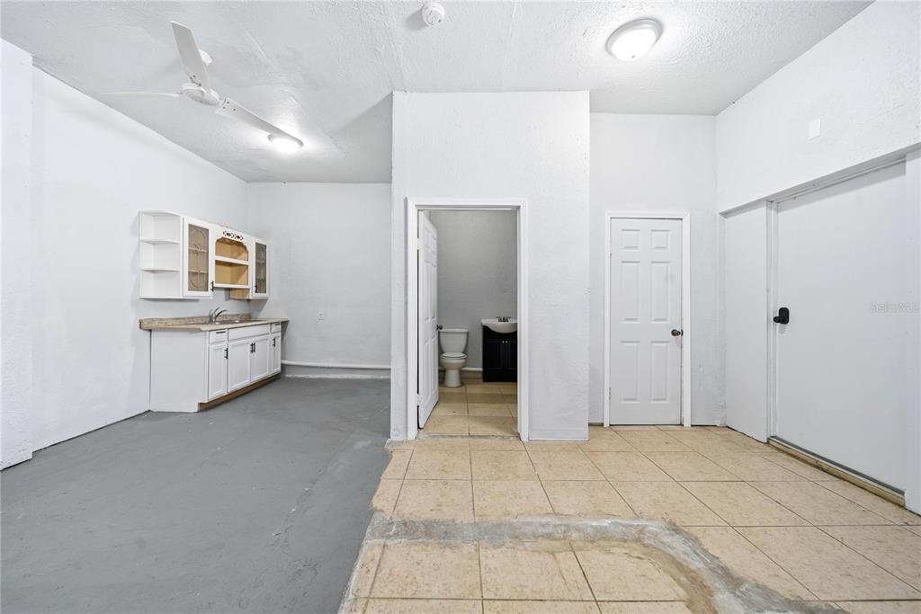 4988 Clarcona Ocoee Road Orlando, FL 32810 - Photo 35 of 48 a view of a hallway with closet and bathroom