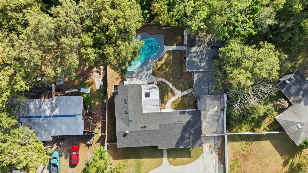 4988 Clarcona Ocoee Road Orlando, FL 32810 - Photo 42 of 48 an aerial view of residential houses with outdoor space