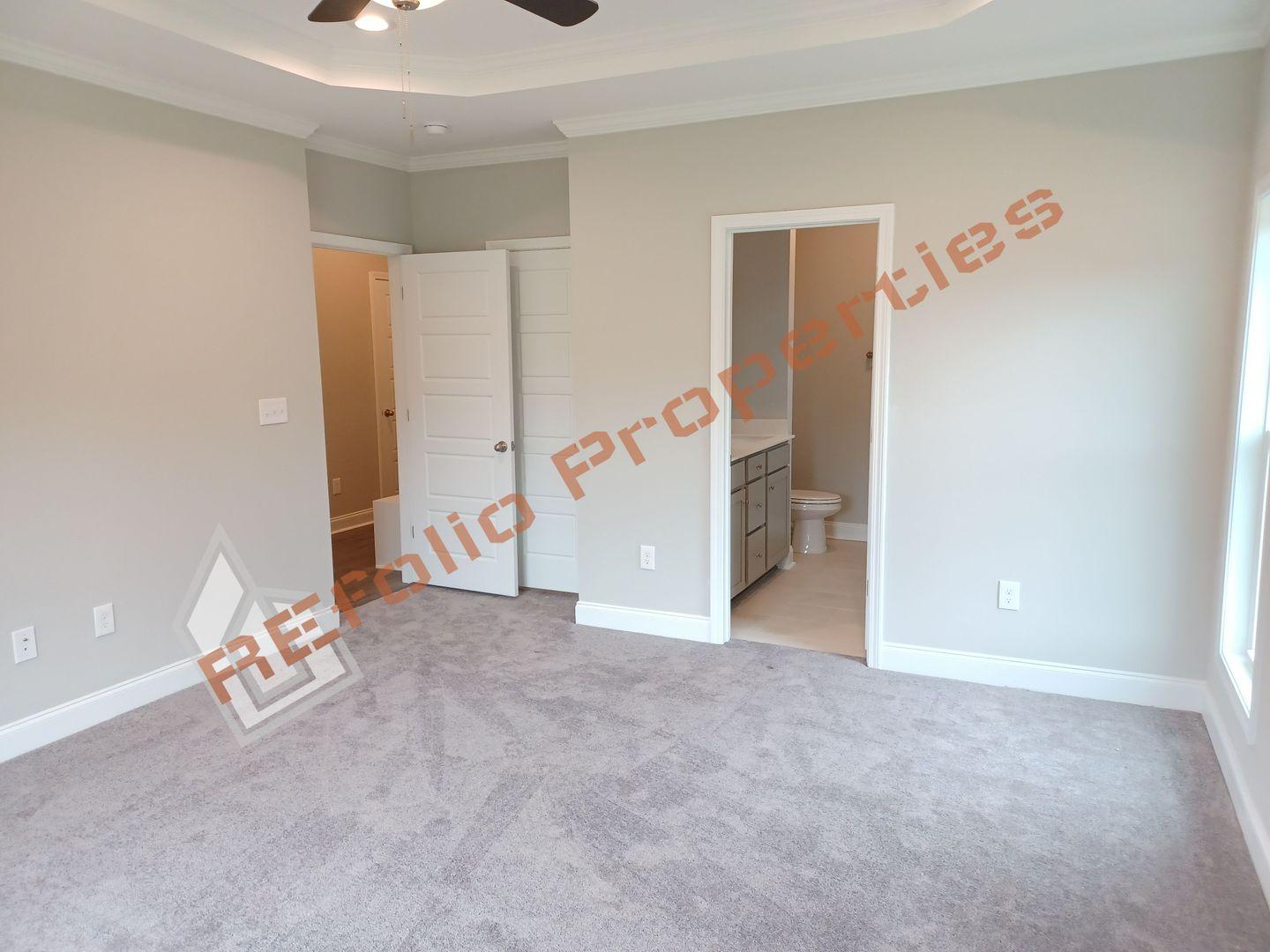 184 Howards Crossing Drive Wendell, NC 27591 - Photo 11 of 29 a view of an empty room