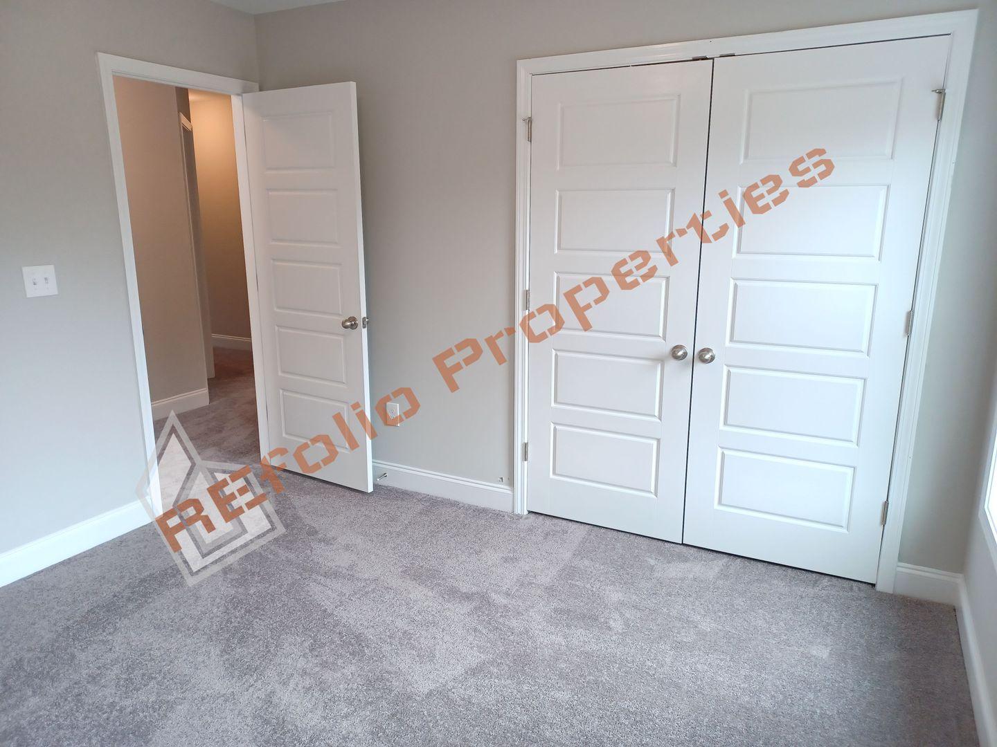 184 Howards Crossing Drive Wendell, NC 27591 - Photo 18 of 29 an entryway with an empty room