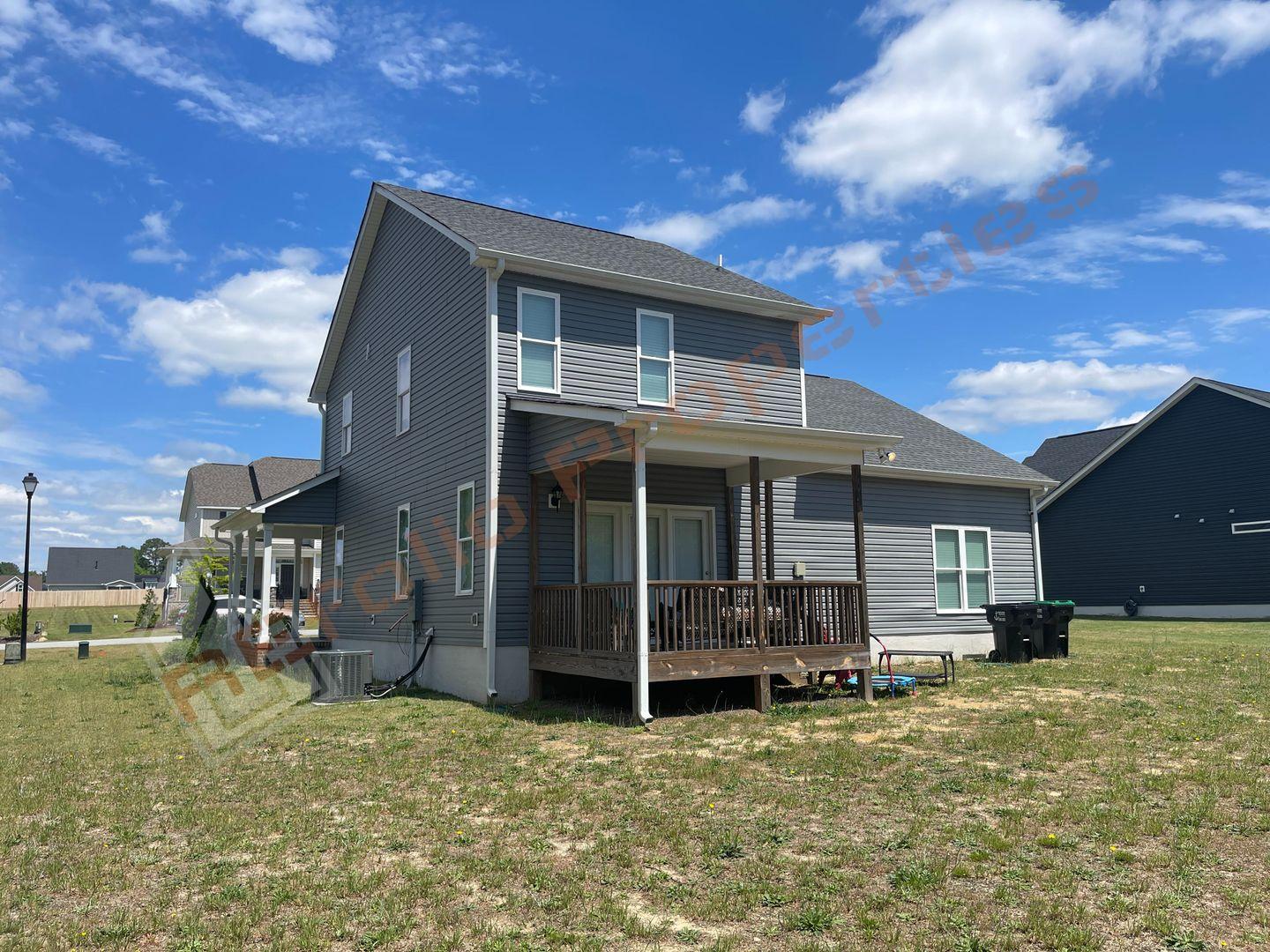184 Howards Crossing Drive Wendell, NC 27591 - Photo 29 of 29 a view of a house with a backyard