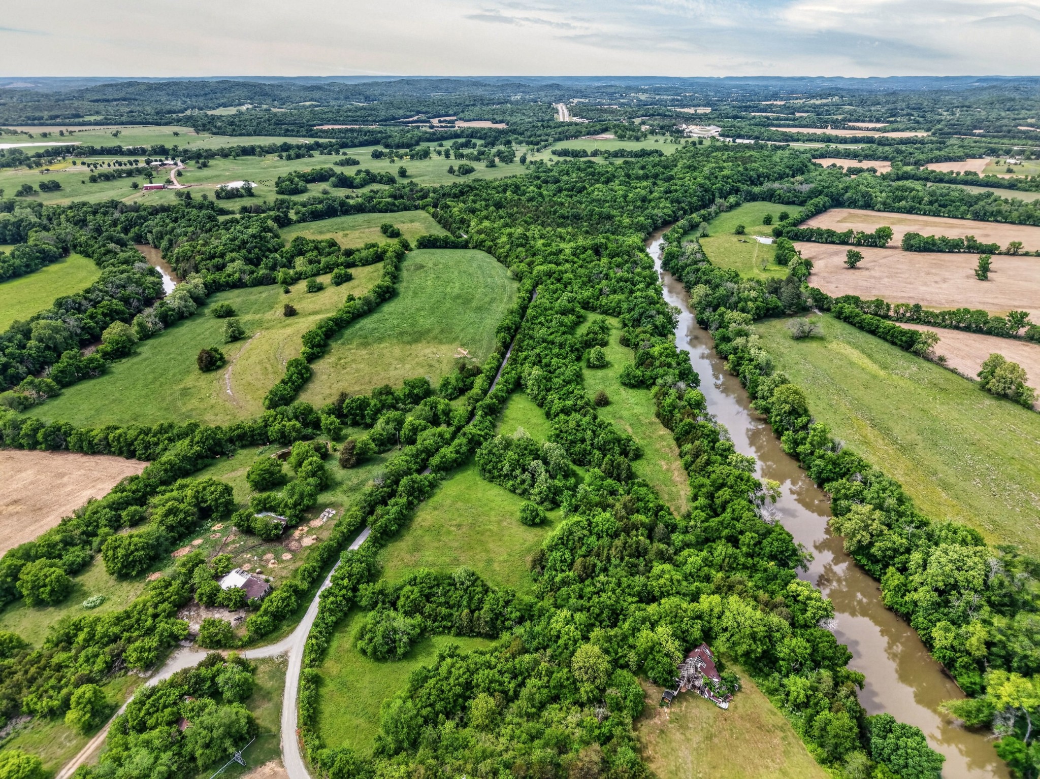 0 Morgan Bend Road Fayetteville, TN 37334 - Photo 4 of 12 a view of a city with lush green forest
