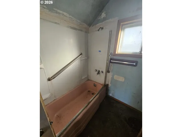 a view of hallway with stairs