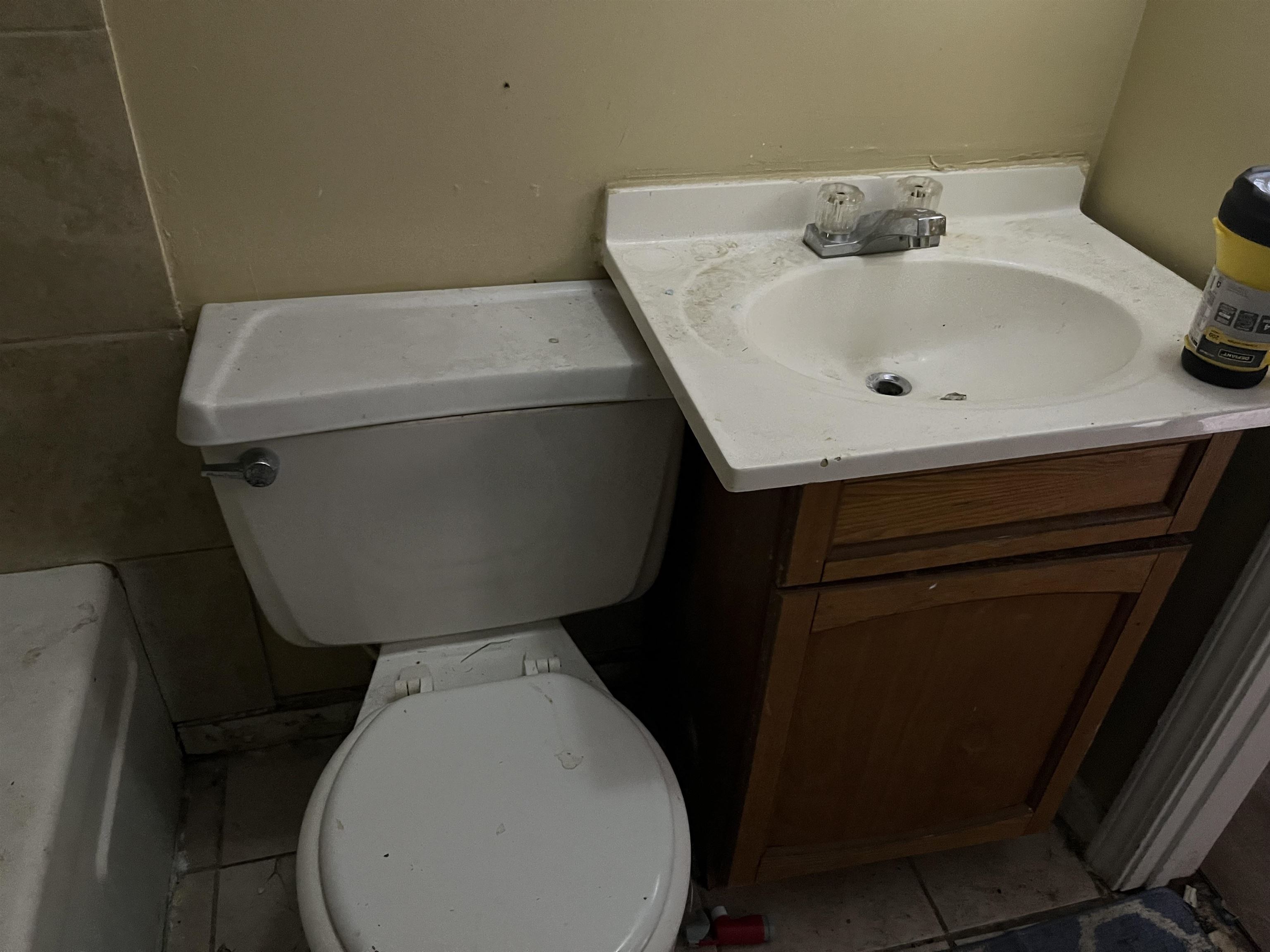 100 Silverage Avenue Memphis, TN 38109 - Photo 24 of 30 White toilet with visible tank and seat