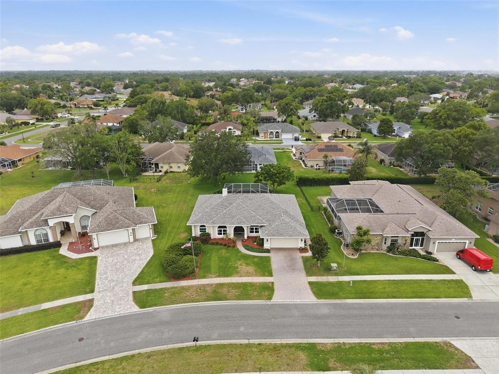 14228 Presteign Lane Spring Hill, FL 34609 - Photo 79 of 89 an aerial view of a house with a big yard
