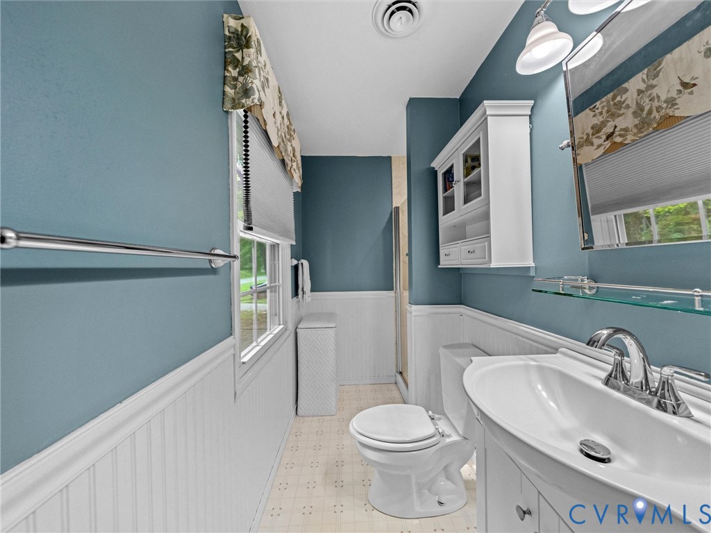 112 Chasnell Road North Chesterfield, VA 23236 - Photo 43 of 49 Bathroom featuring beadboard wainscoting, a single