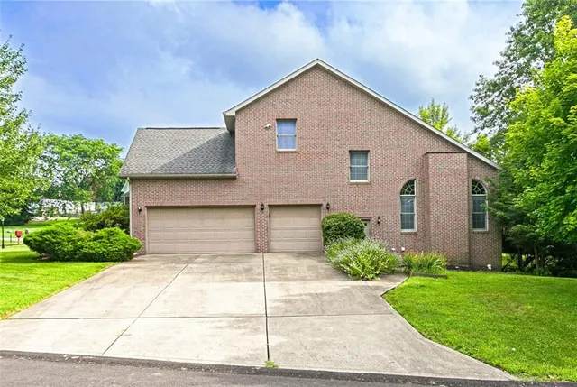 a front view of house with yard