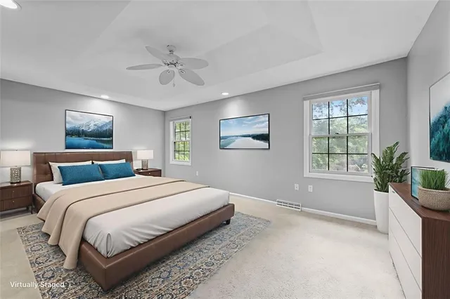 a view of empty room with a ceiling fan
