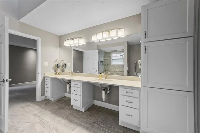 a bathroom with a shower and toilet