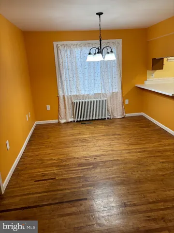 a view of a kitchen with a sink