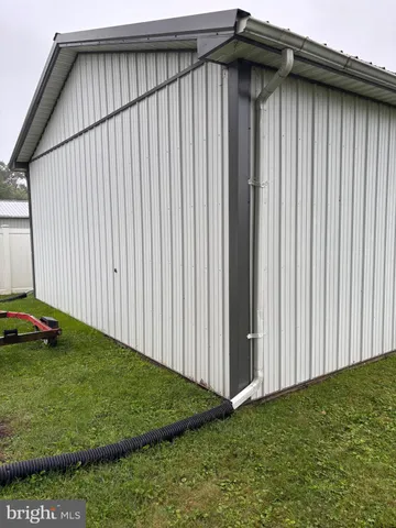 a view of backyard of house