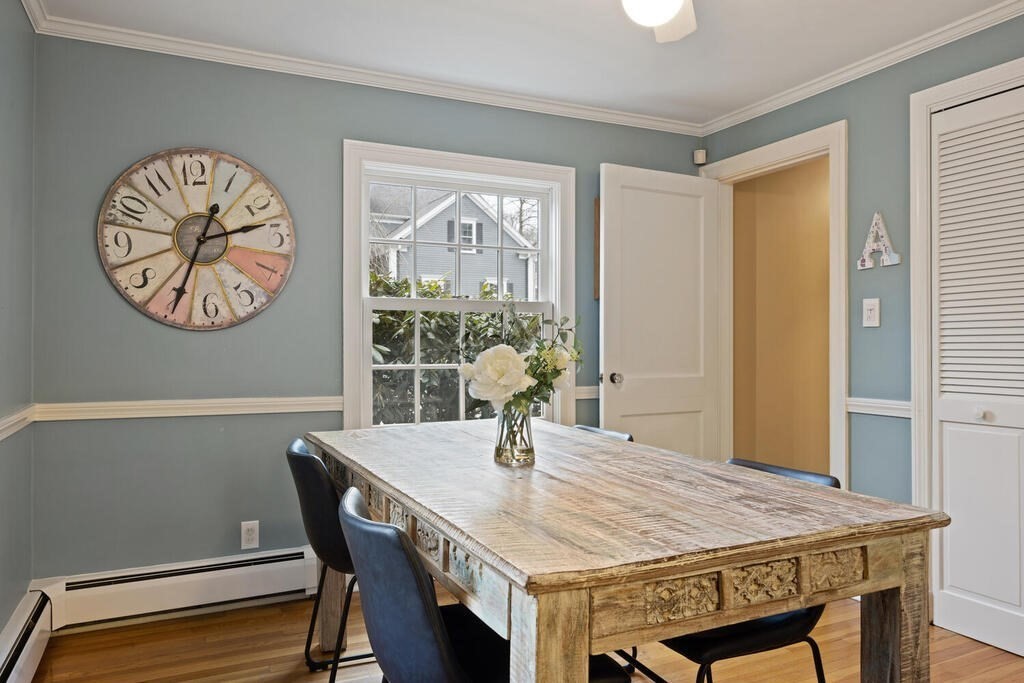 26 Virginia Road Needham, MA 02494 - Photo 13 of 41 a dining room with a table and chairs