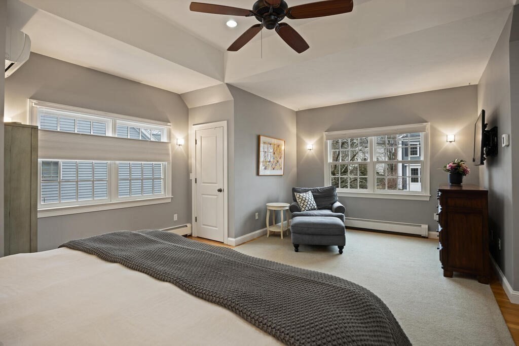 26 Virginia Road Needham, MA 02494 - Photo 21 of 41 a bedroom with a bed and a large window