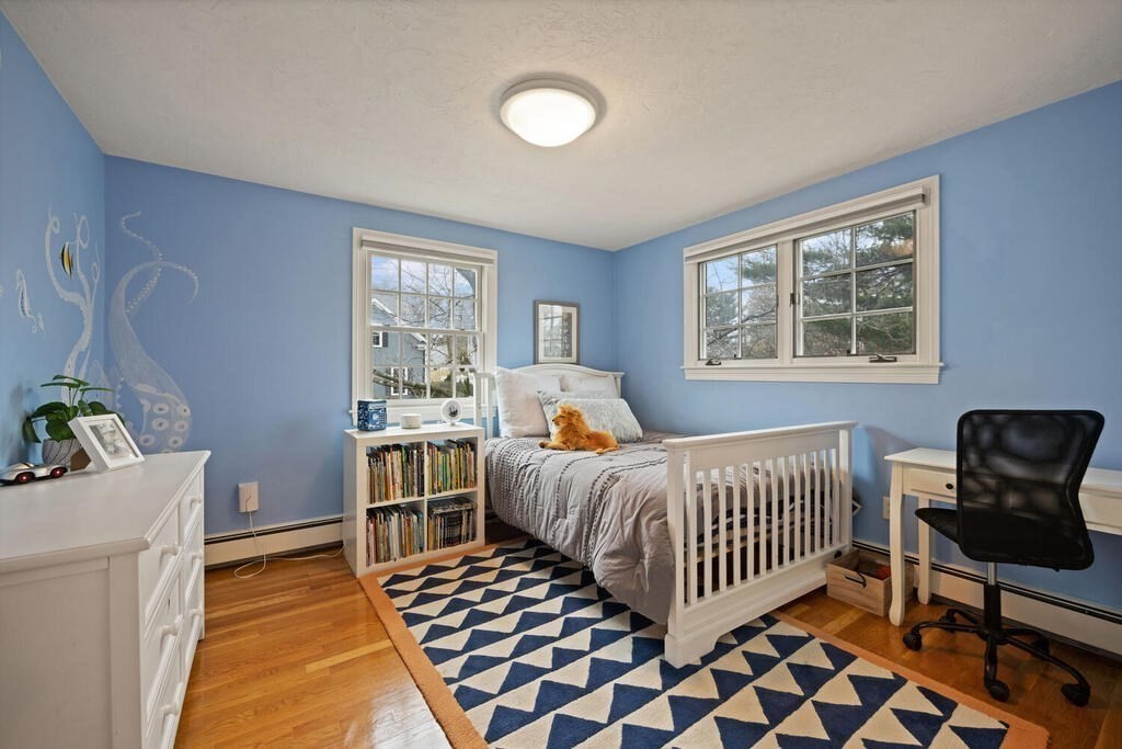 26 Virginia Road Needham, MA 02494 - Photo 23 of 41 a bedroom with furniture and a window