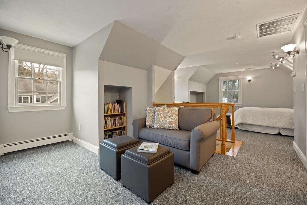 26 Virginia Road Needham, MA 02494 - Photo 32 of 41 a living room with furniture and a window