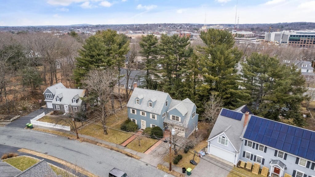 26 Virginia Road Needham, MA 02494 - Photo 4 of 41 an aerial view of a house with outdoor space