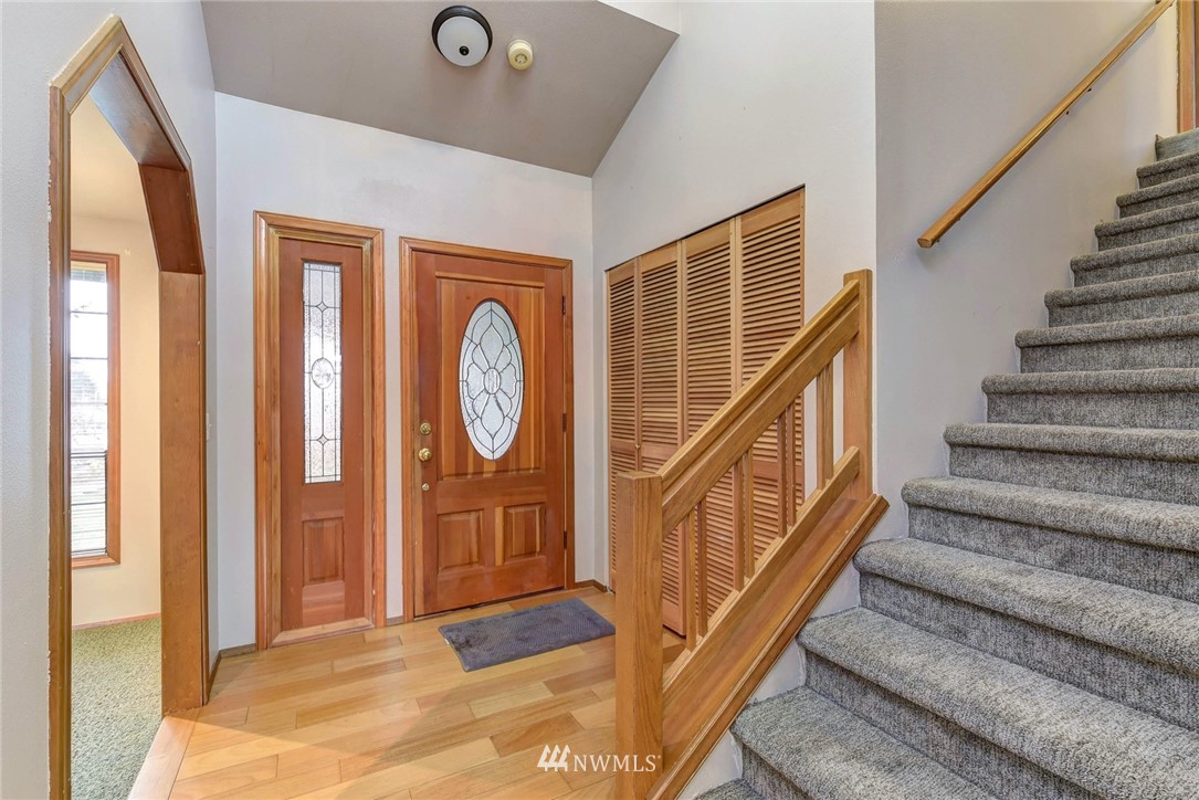 23814 23rd Drive Southeast Bothell, WA 98021 - Photo 12 of 26 a view of entryway with wooden floor and front door