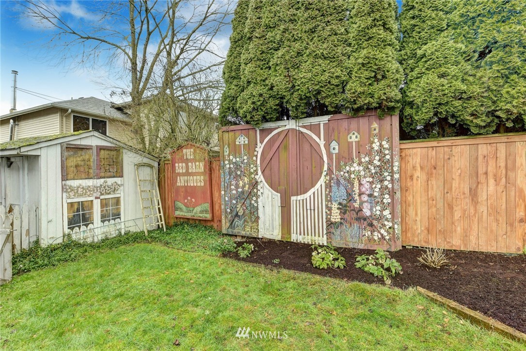 23814 23rd Drive Southeast Bothell, WA 98021 - Photo 21 of 26 a front view of a house with garden
