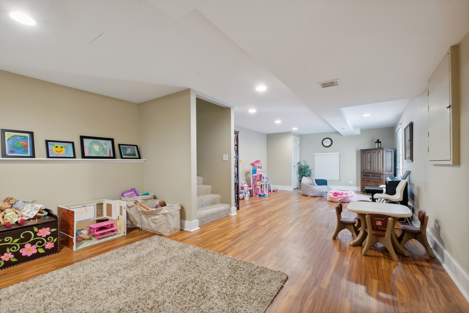 707 Westgate Road Deerfield, IL 60015 - Photo 22 of 33 a living room with furniture and wooden floor