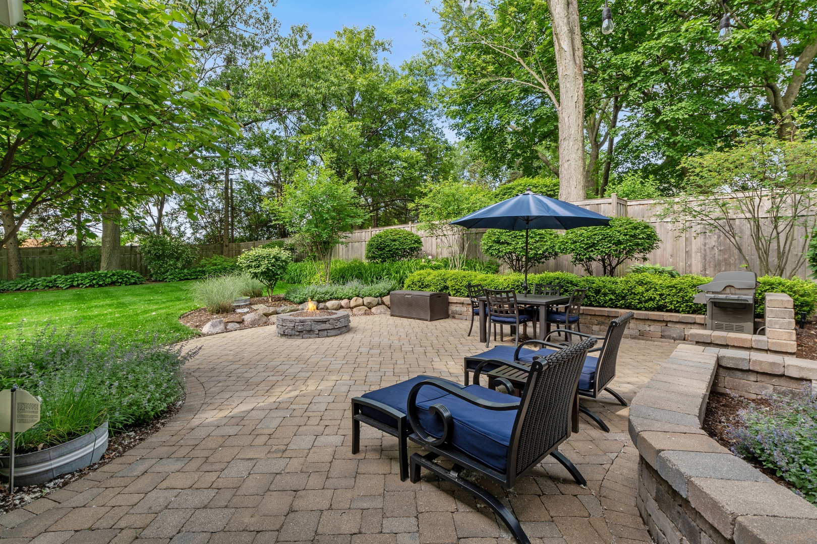 707 Westgate Road Deerfield, IL 60015 - Photo 26 of 33 a view of a backyard with sitting area and garden