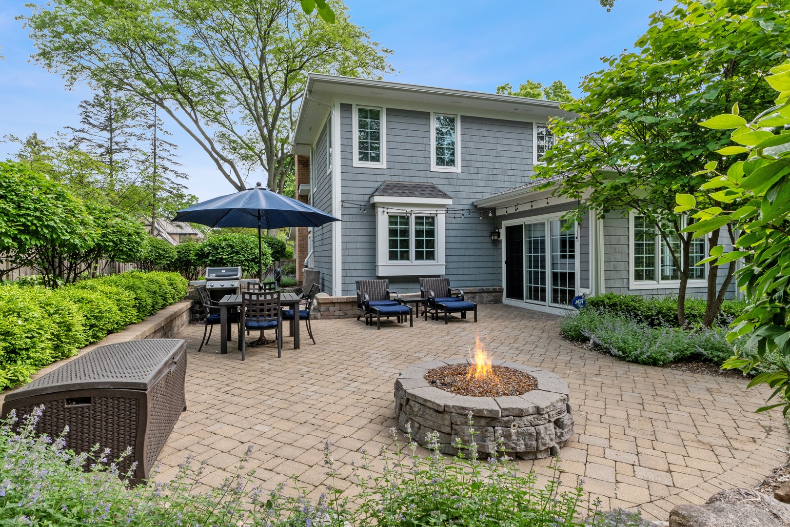 707 Westgate Road Deerfield, IL 60015 - Photo 27 of 33 a view of house with backyard and outdoor seating