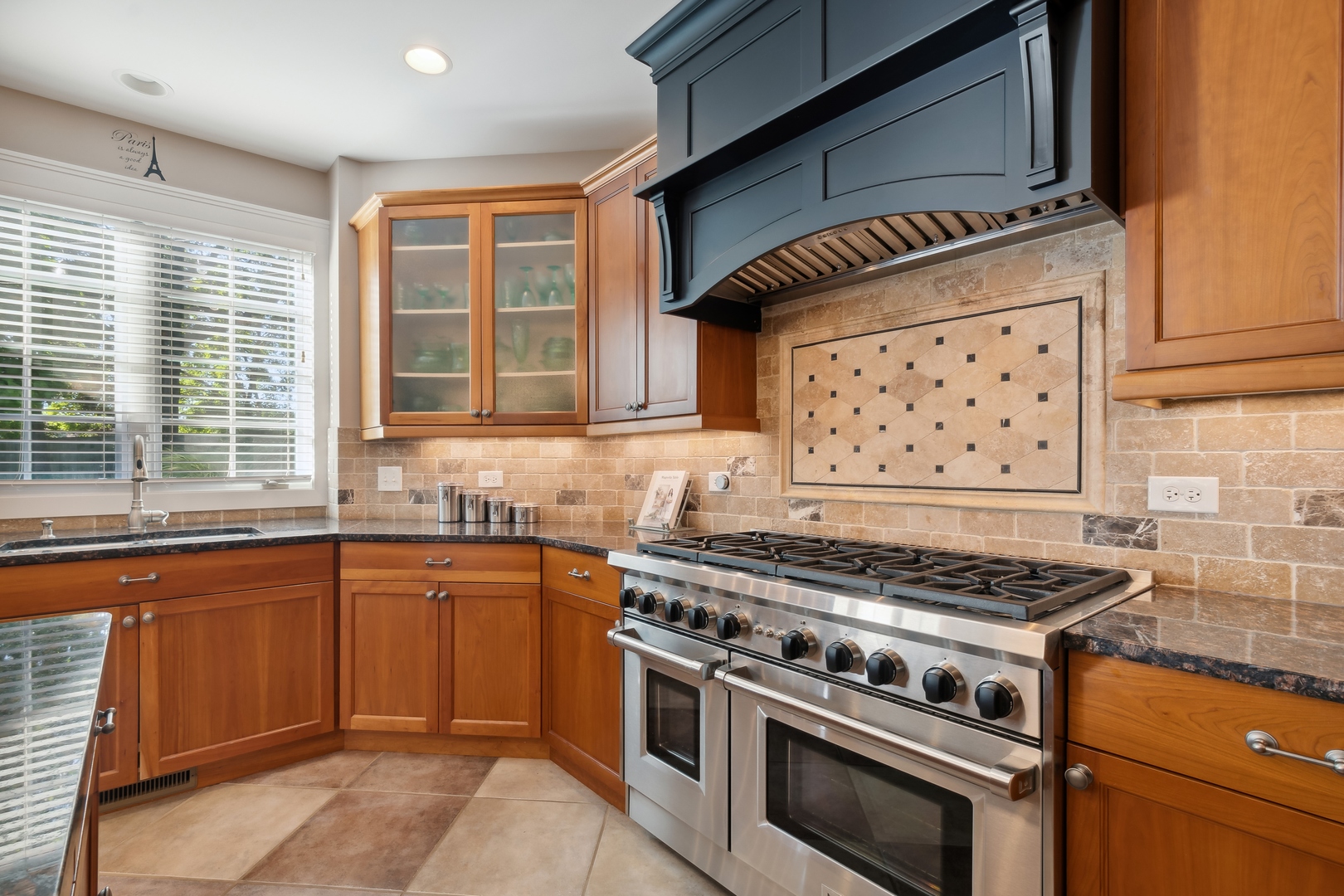 707 Westgate Road Deerfield, IL 60015 - Photo 7 of 33 a kitchen with stainless steel appliances granite countertop a stove and a sink