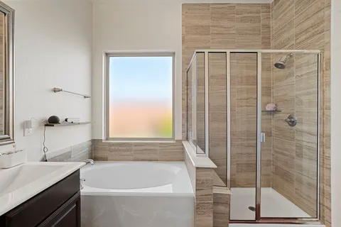 a bathroom with a sink and a bathtub