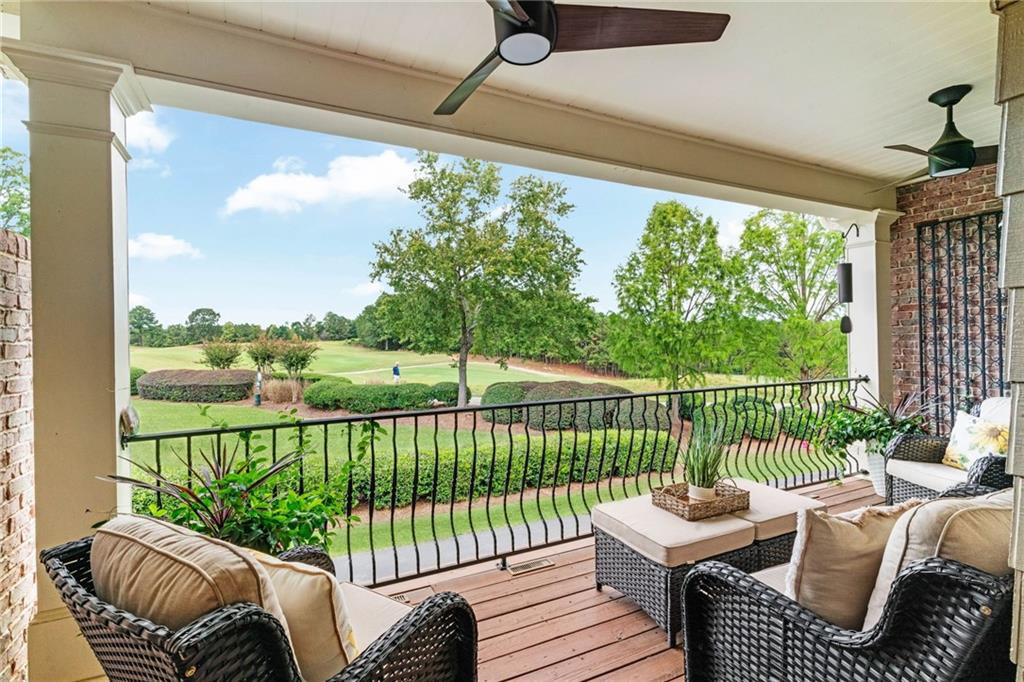 a view of balcony with furniture