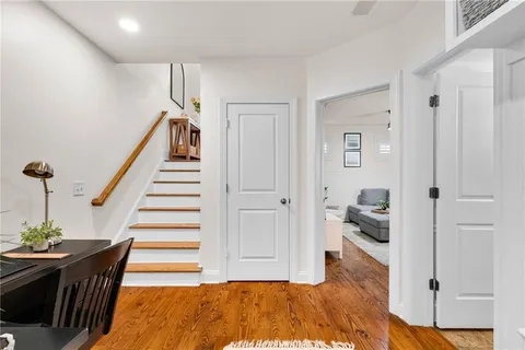 a view of a patio with couches and potted plant