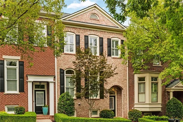 a view of a lake with building in front of it