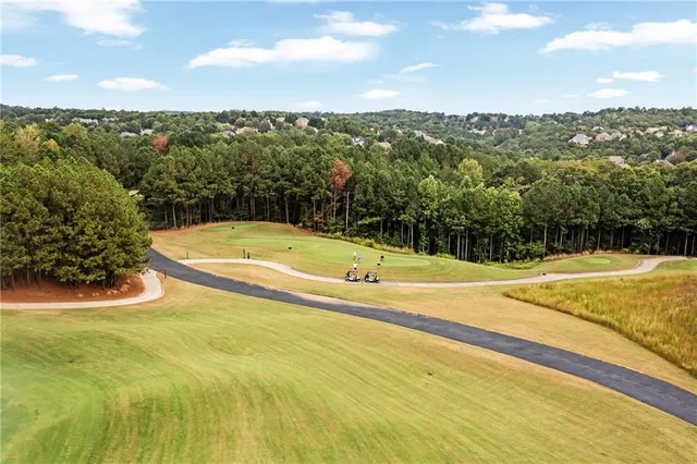an aerial view of residential house with outdoor space and river
