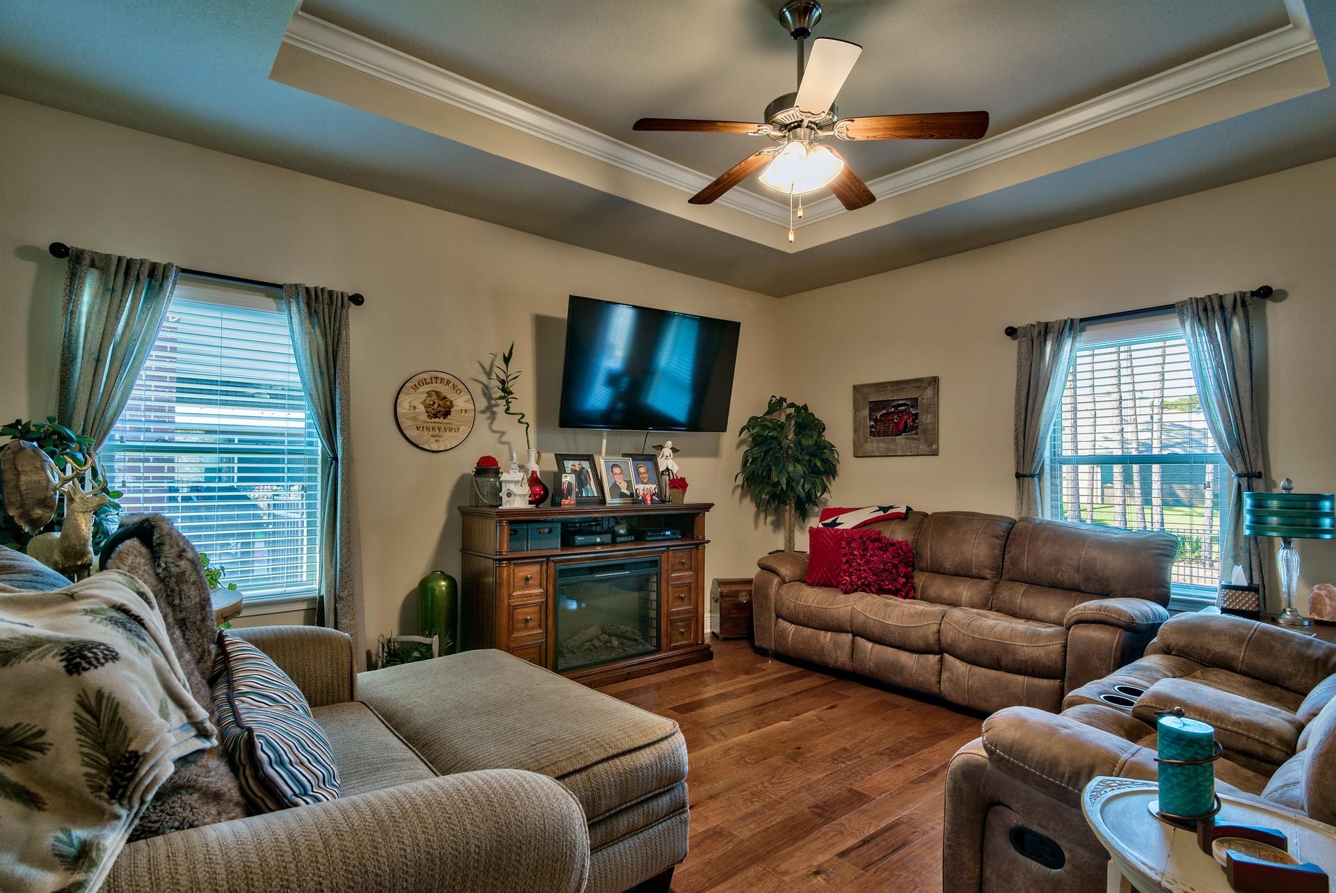 56 Pin Oak Loop Santa Rosa Beach, FL 32459 - Photo 11 of 27 a living room with furniture a flat screen tv and a window