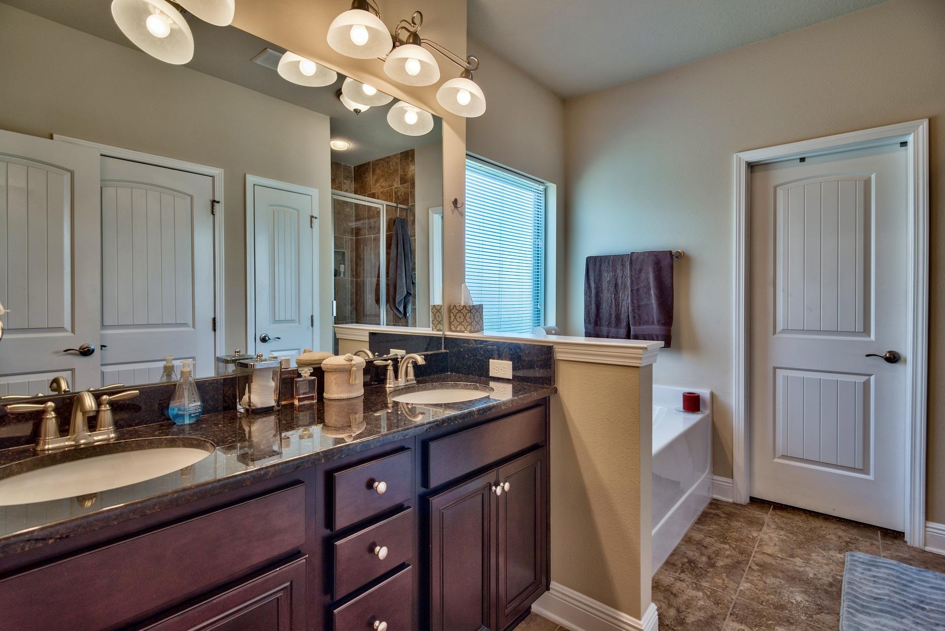56 Pin Oak Loop Santa Rosa Beach, FL 32459 - Photo 15 of 27 a kitchen with a refrigerator and a sink