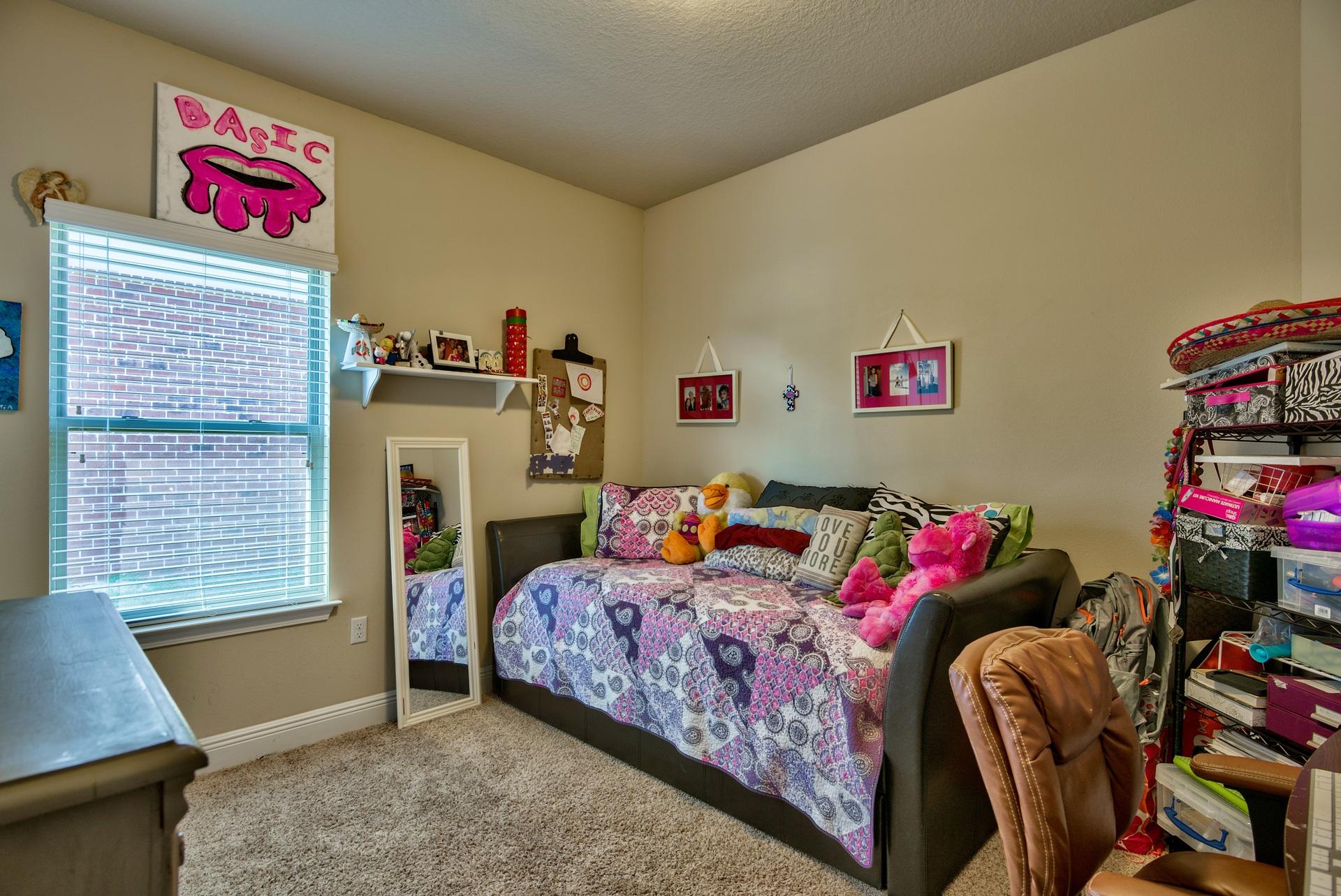 56 Pin Oak Loop Santa Rosa Beach, FL 32459 - Photo 18 of 27 a bedroom with a bed and a window