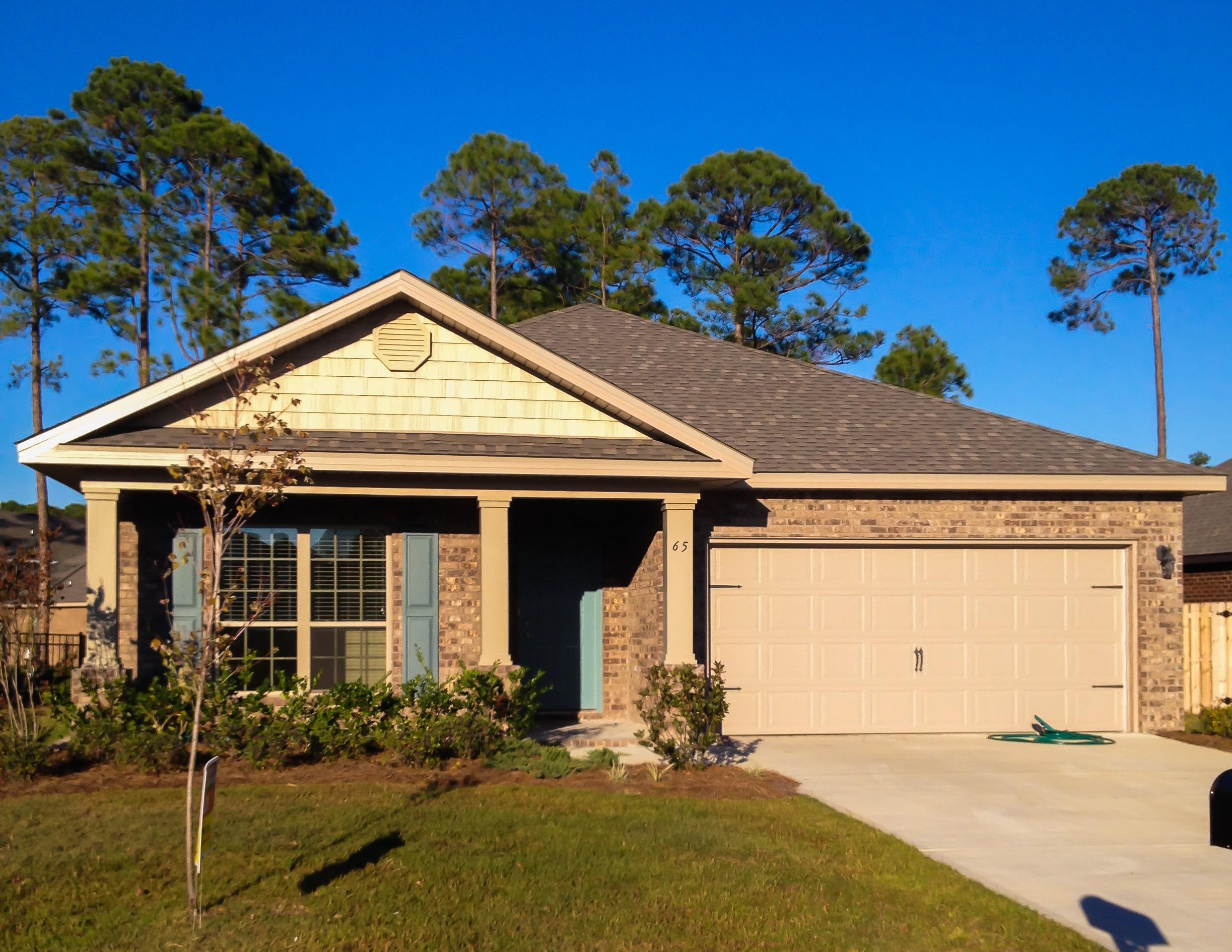 56 Pin Oak Loop Santa Rosa Beach, FL 32459 - Photo 2 of 27 a front view of a house