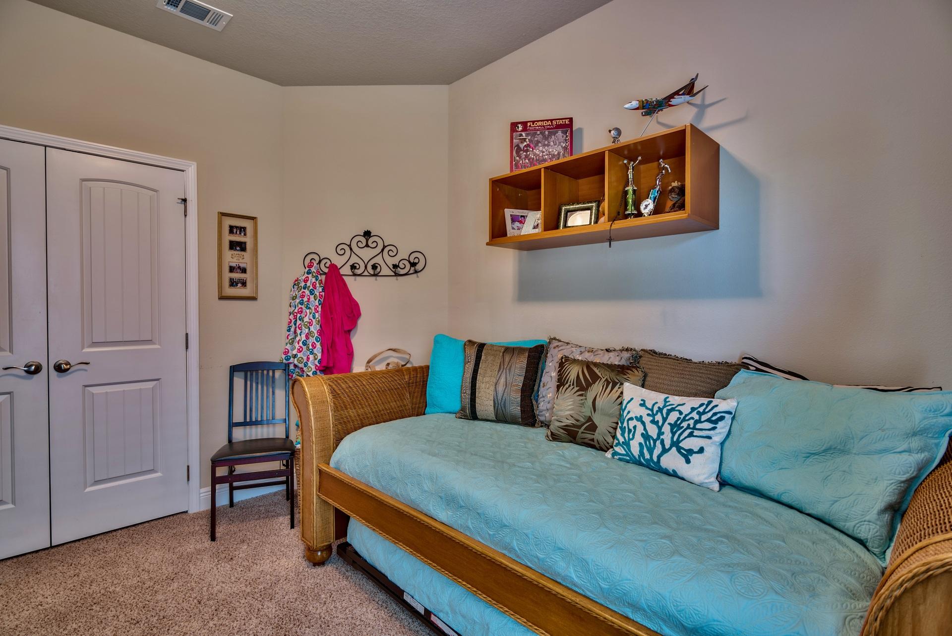 56 Pin Oak Loop Santa Rosa Beach, FL 32459 - Photo 21 of 27 a living room with a couch and dresser
