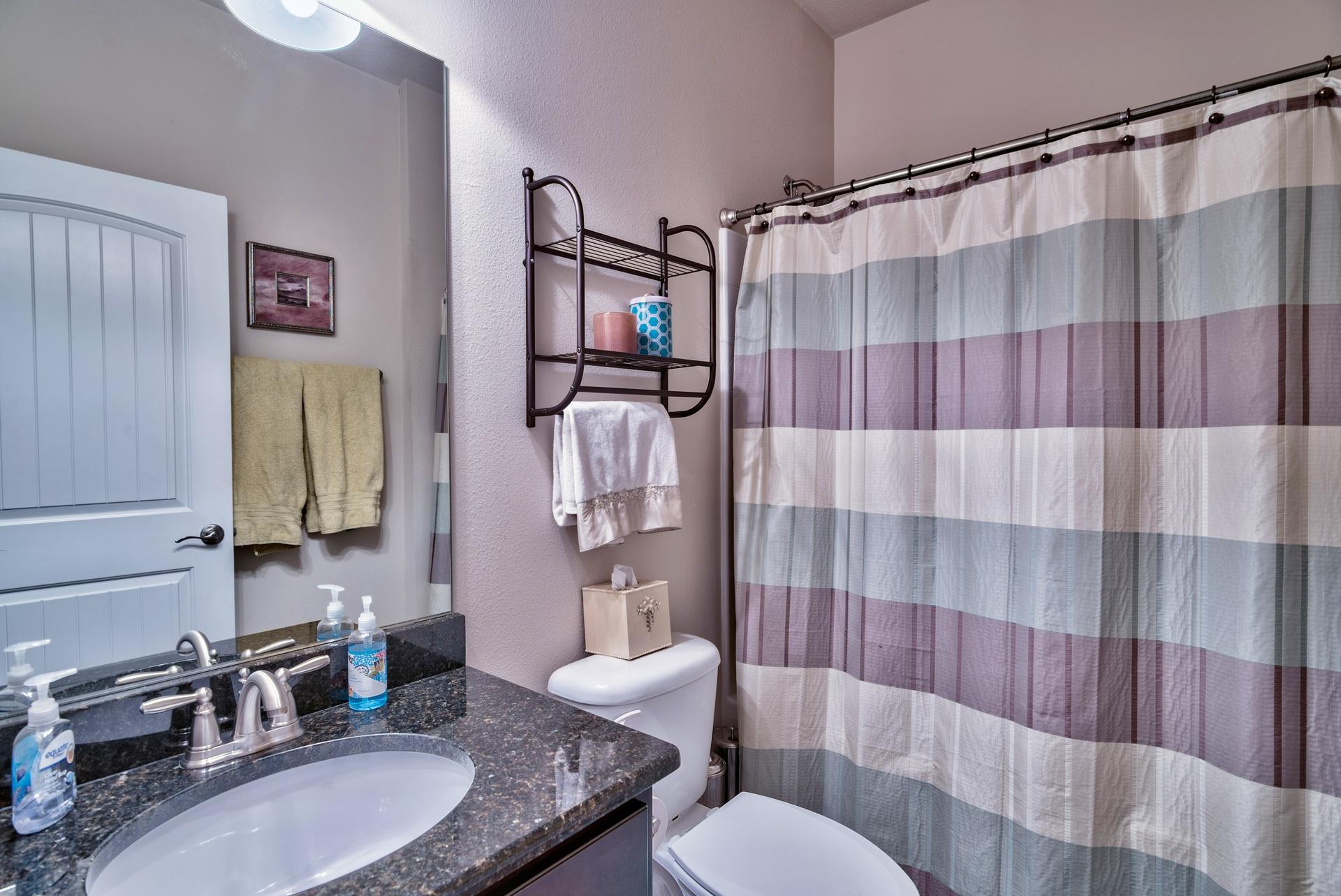 56 Pin Oak Loop Santa Rosa Beach, FL 32459 - Photo 22 of 27 a bathroom with a sink toilet and shower