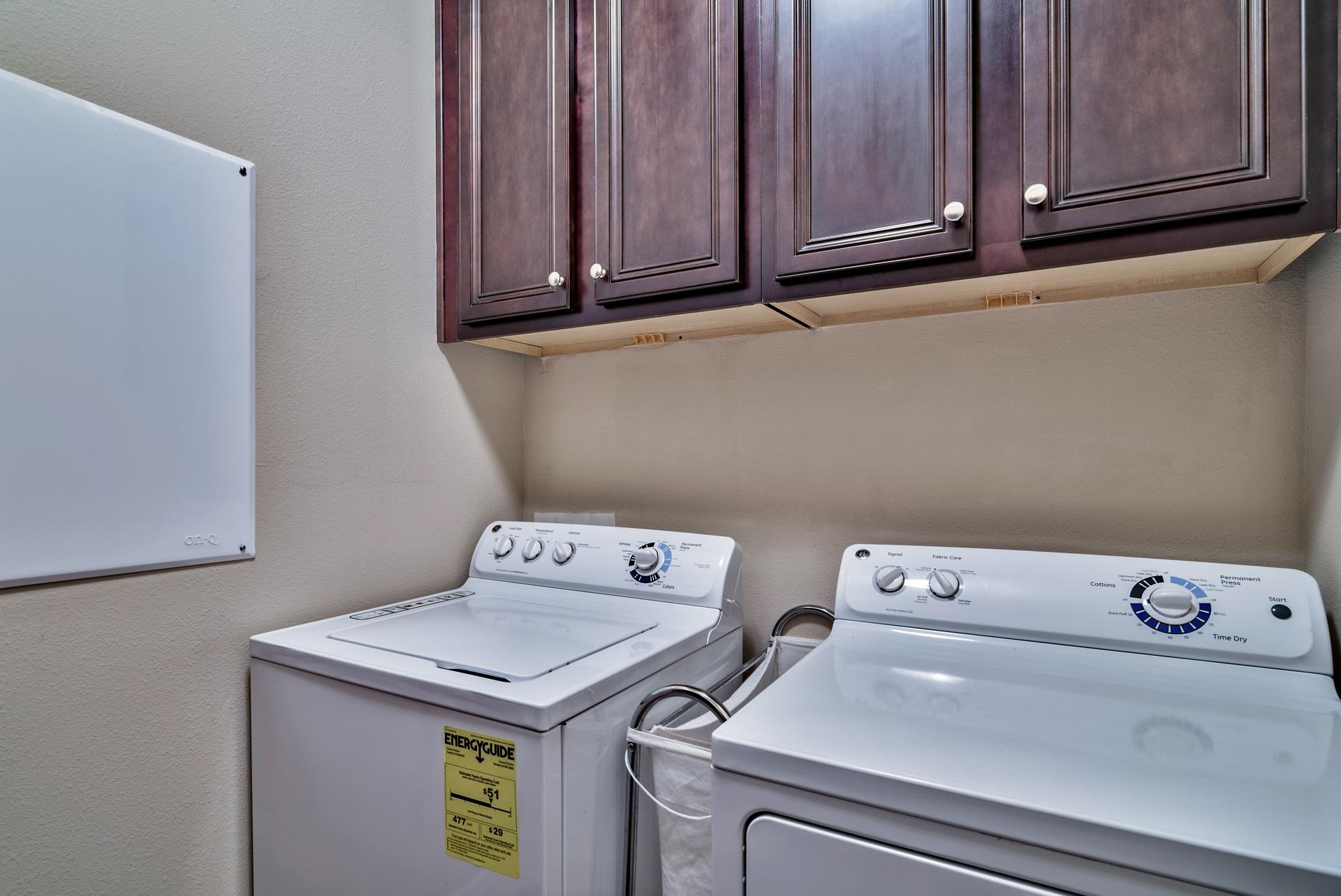 56 Pin Oak Loop Santa Rosa Beach, FL 32459 - Photo 23 of 27 a utility room with dryer and washer