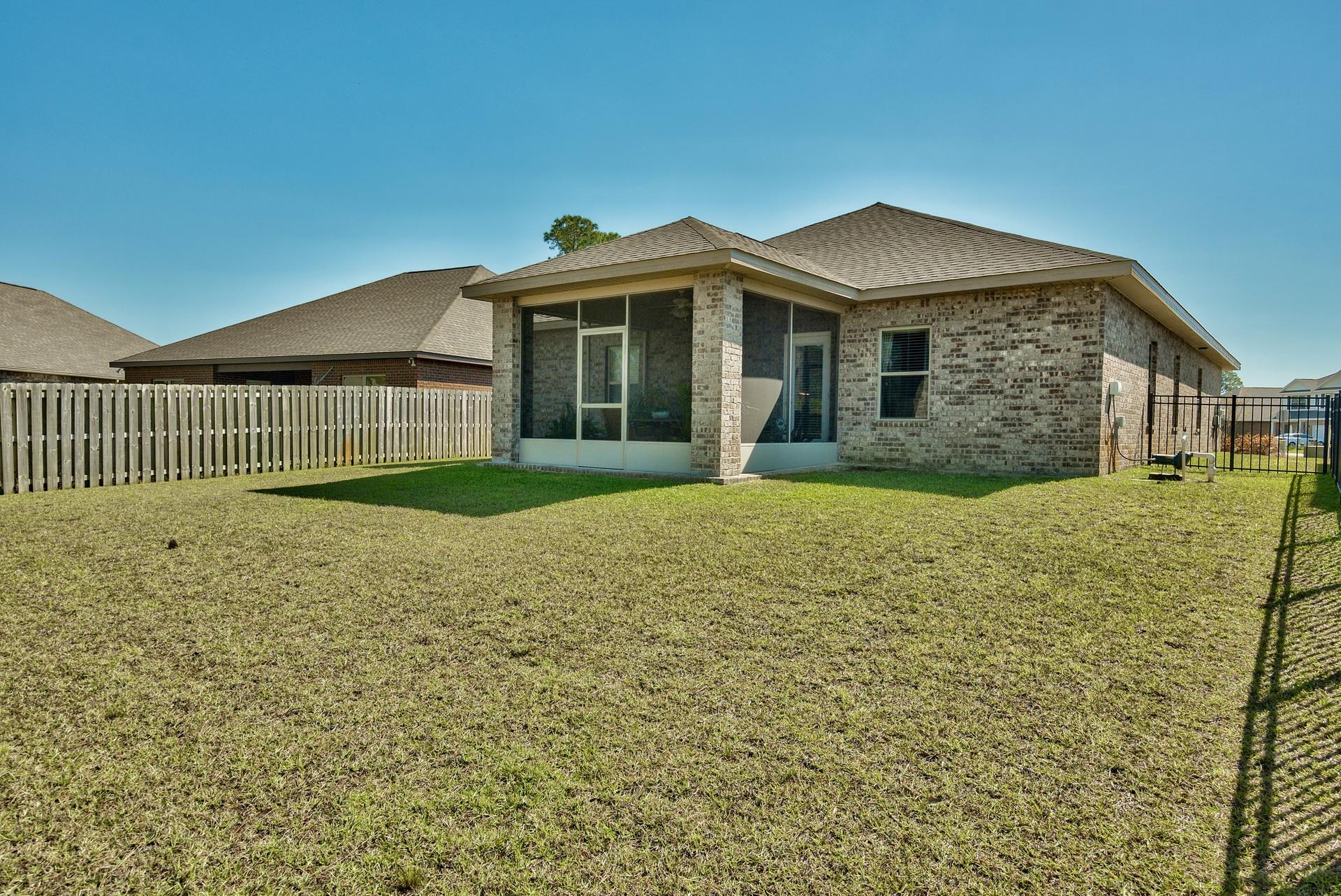 56 Pin Oak Loop Santa Rosa Beach, FL 32459 - Photo 26 of 27 a front view of a house with a yard