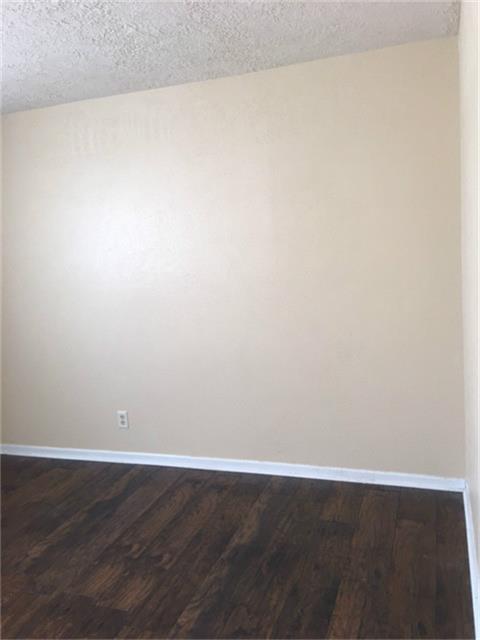 275 North 7th Street, Unit 5 Beaumont, TX 77702 - Photo 2 of 9 a view of an empty room